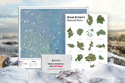 Picture of a collection of map-based gifts on a snow covered background