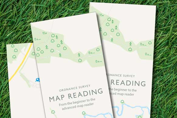 Map reading guides on grass